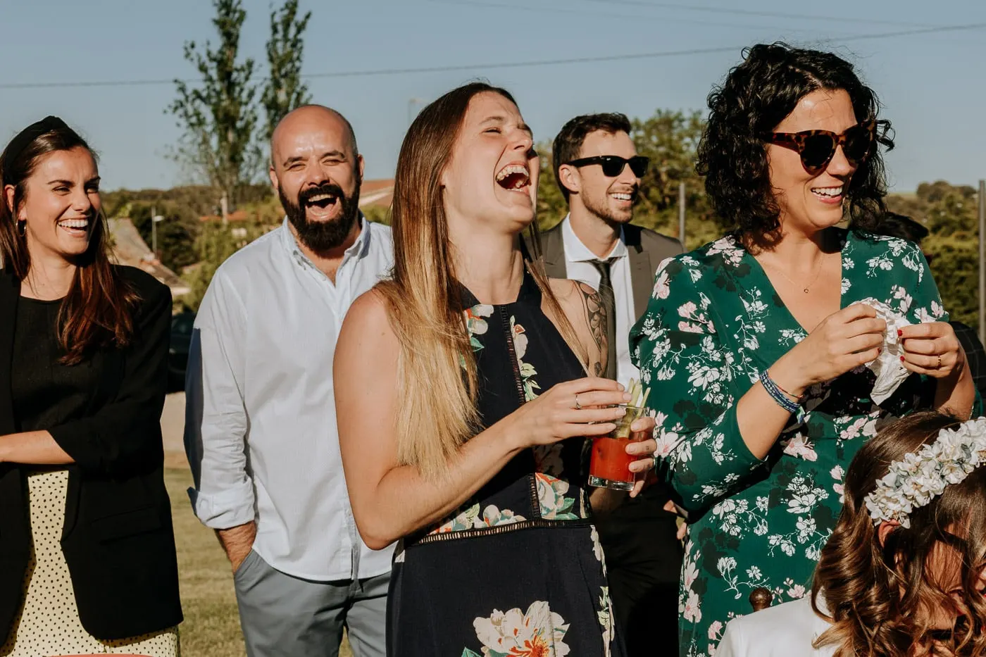 Friends laughing before the ceremony at Castillo del Buen Amor