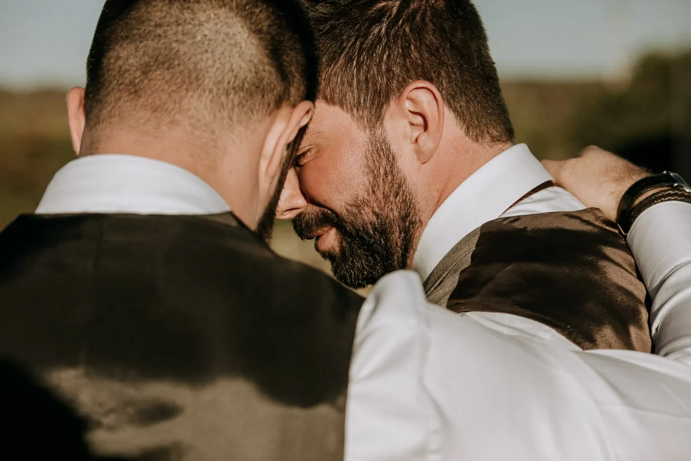 The grooms forehead to forehead in an embrace, Castillo del Buen Amor