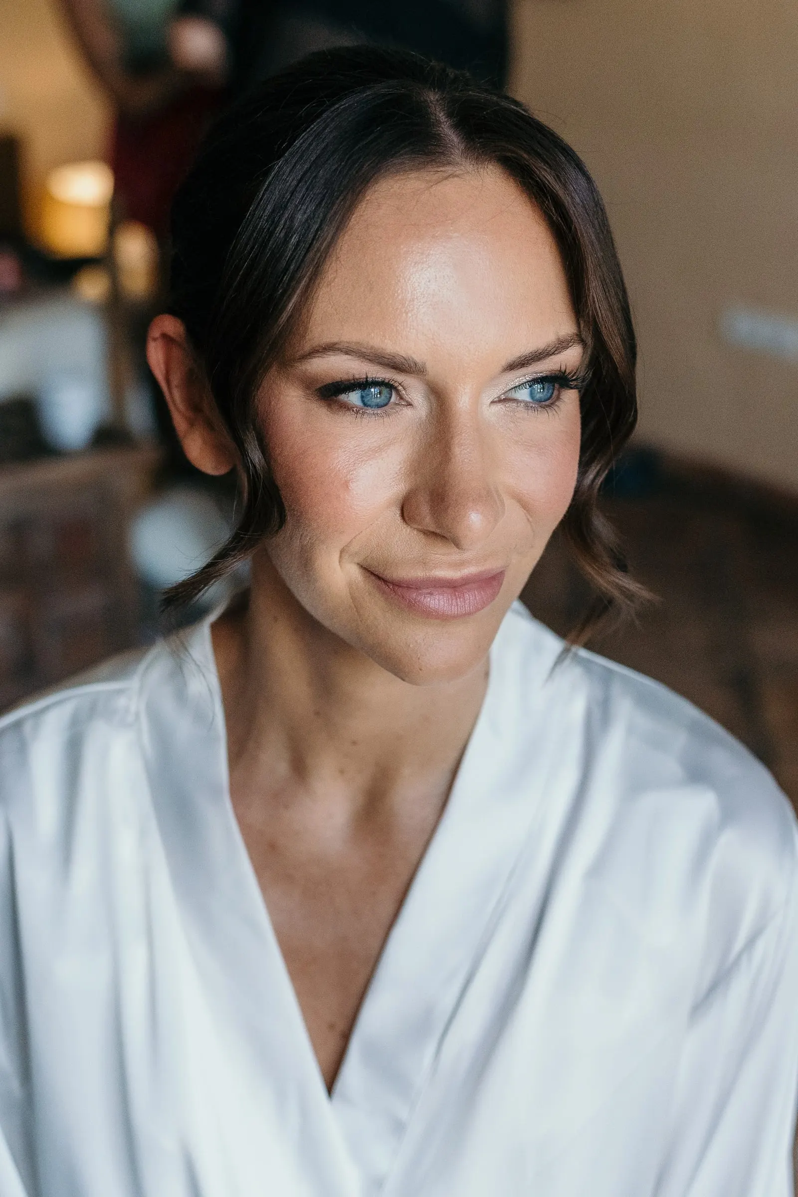 Close portrait of the bride in her robe before the wedding in Mijas