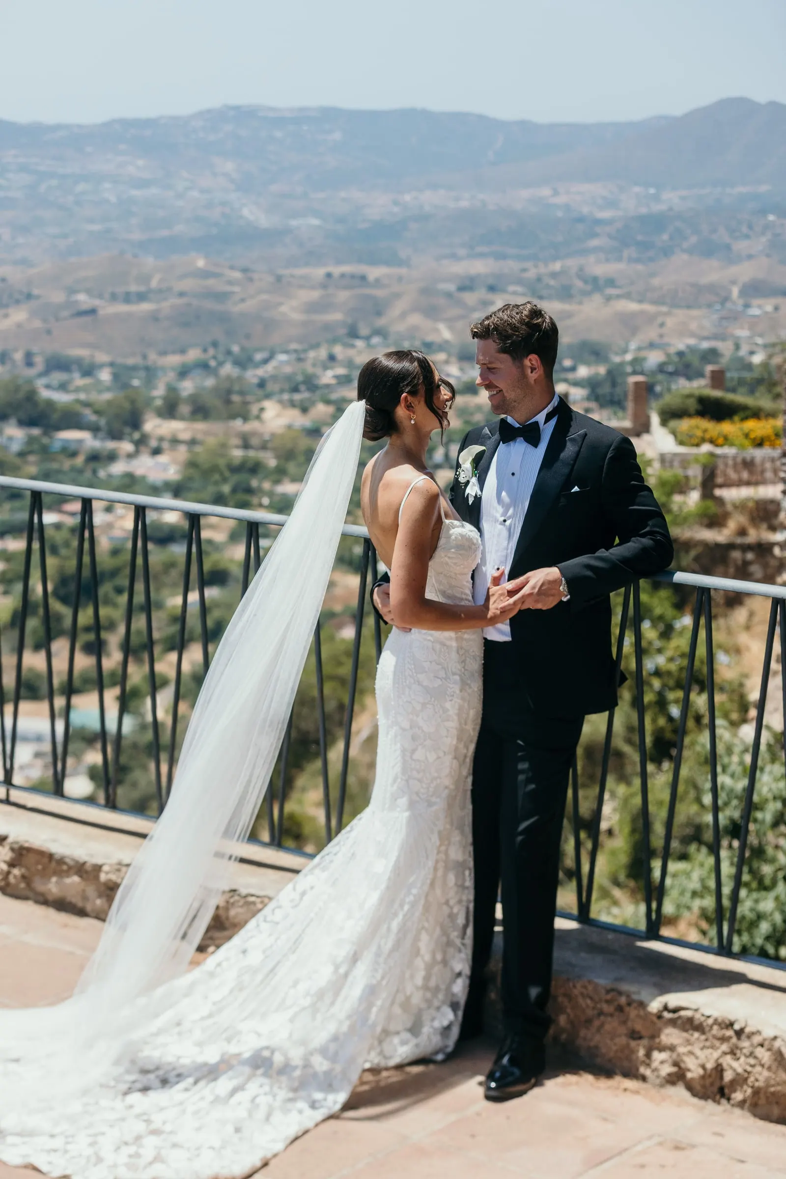 Wedding portrait at the Mijas Pueblo viewpoint with the Mediterranean behind