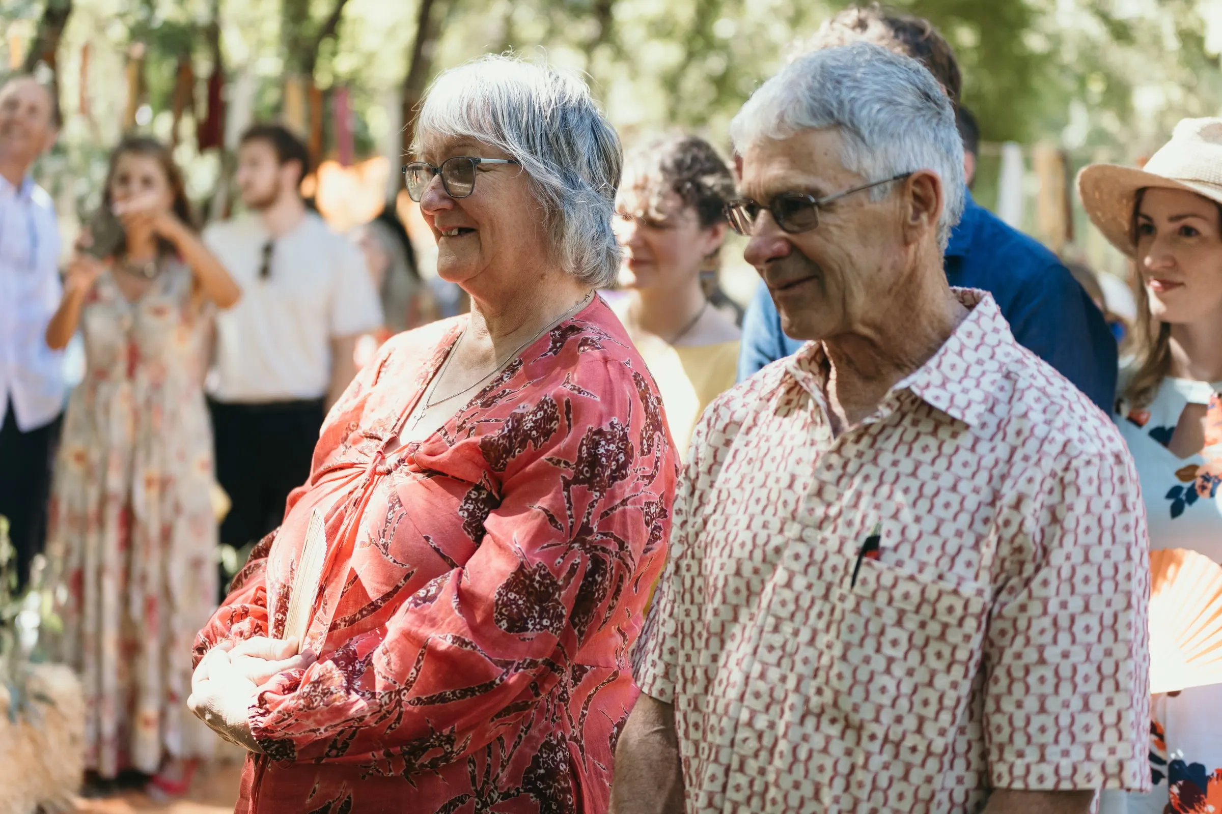 Groom's parents watching the ceremony with emotion