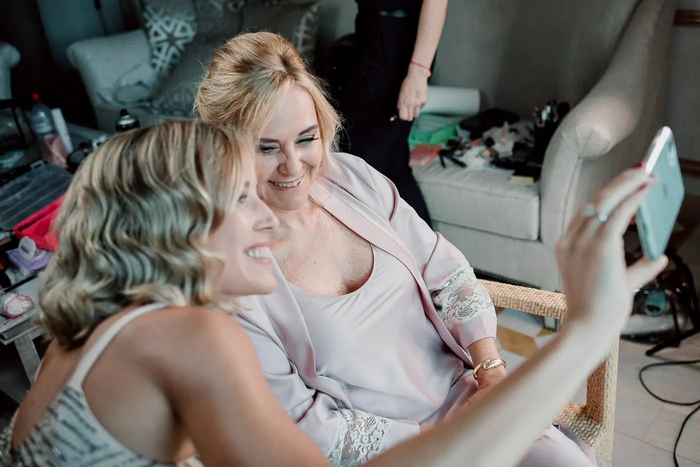 Bride and a friend taking a selfie together