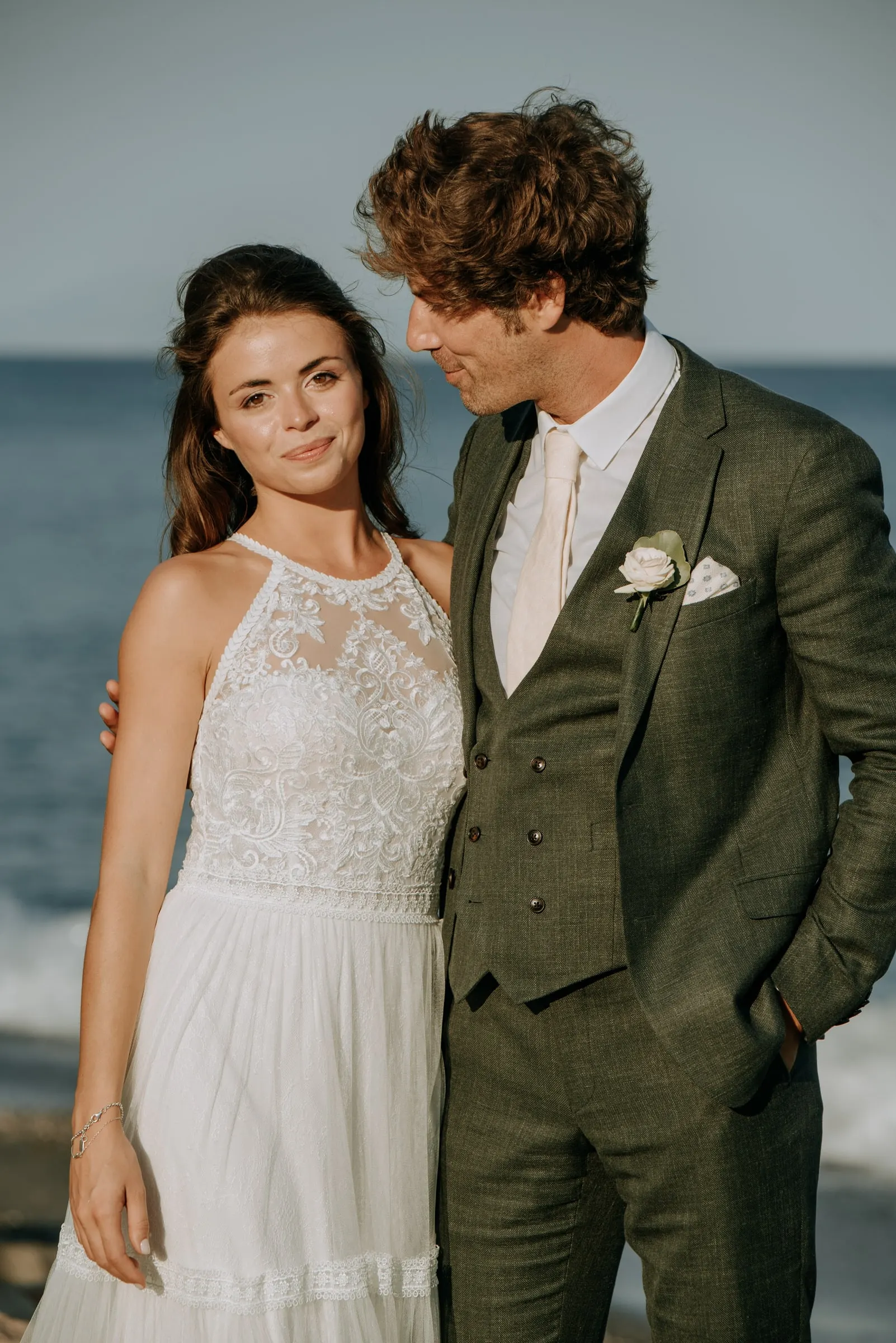 Portrait of the bride and groom standing together by the sea, Trocadero, Sotogrande